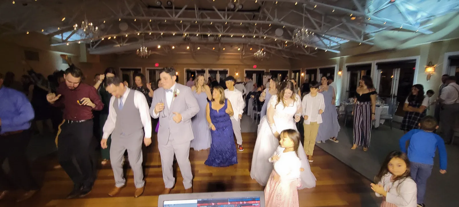 Wedding guests filling the dance floor at Granite Bay Golf Club, Granite Bay CA