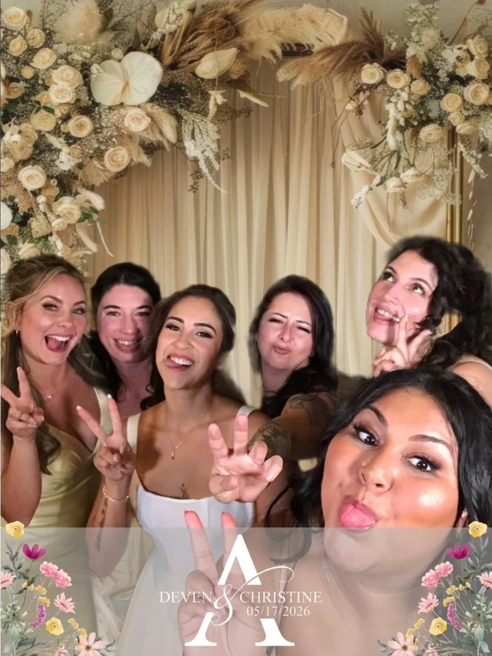 Friends making fun faces at the J Crew digital LED photo booth